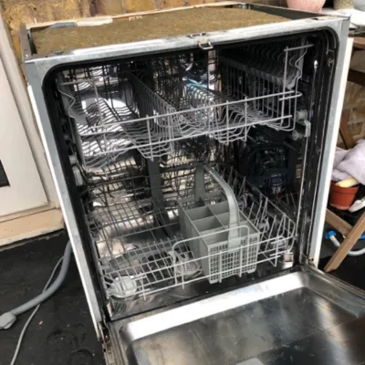 open integrated dishwasher collected for £40 as an example of how to dispose of an old dishwasher