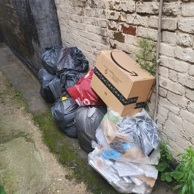rubbish bags and cardboard for collection £40