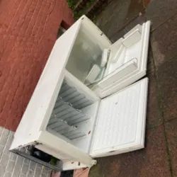 fridge removed by waste collector in Brighton