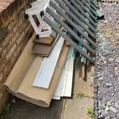 KT2 wood, cardboard, carpet, metal removed for £45 as an example of how to dispose of rubbish in richmond