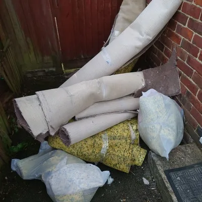 rolled up carpet disposed for the cost of £55